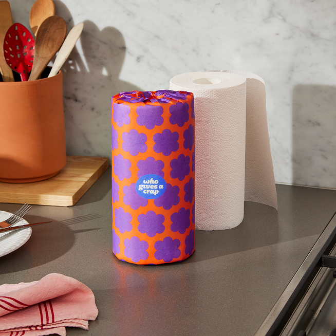 Single roll of Who Gives a Crap paper towel on kitchen bench